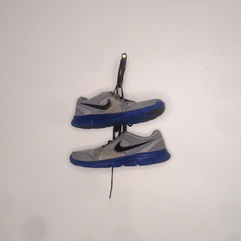 Blue and gray Nike running shoes size 7 women's